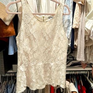 Cream peplum top with lace overlay